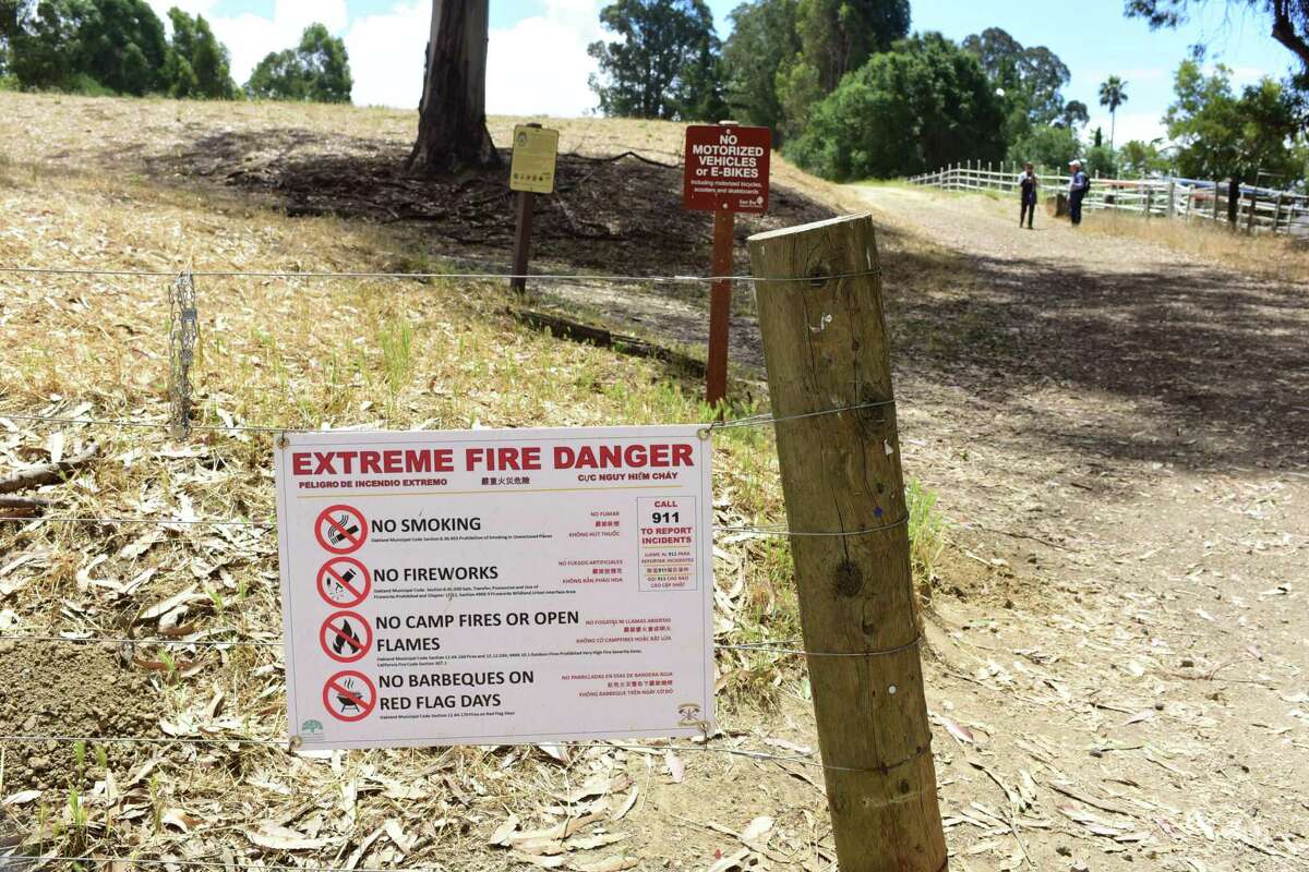 A sign at Anthony Chabot Regional Park warns vistors to take precautions due to the extreme fire danger.