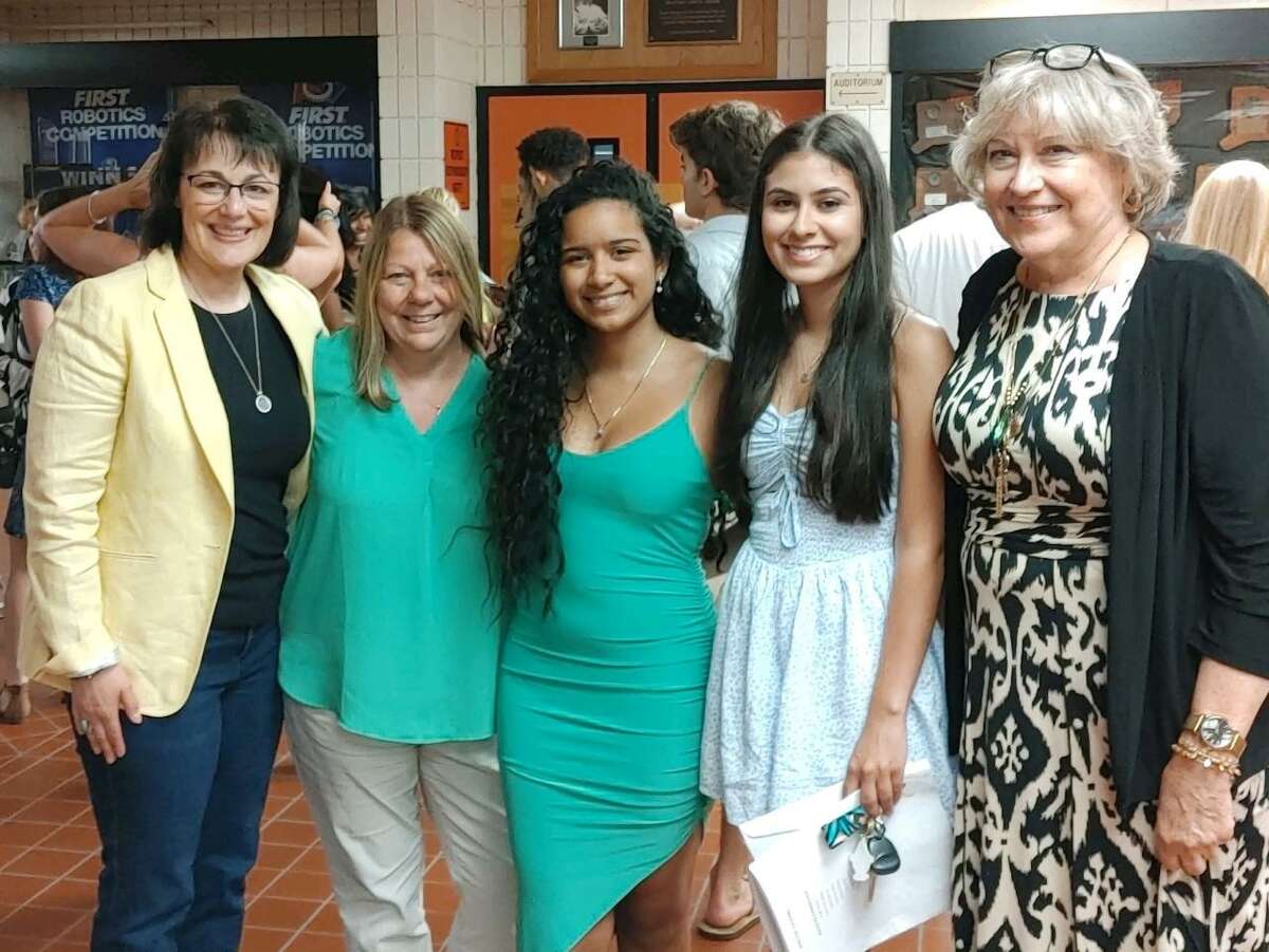 Female members of the Shelton Democratic Town Committee - better known as The Lady Ds — presented graduating Shelton High seniors Xiomara Santos-Colon and Isabela Silva each with $500 scholarships. Pictured are Diana Meyer, Patti Moonan, Santos-Colon, Silva and Lorraine Rossner. Meyer, Moonan and Rossner are all Board of Education members.