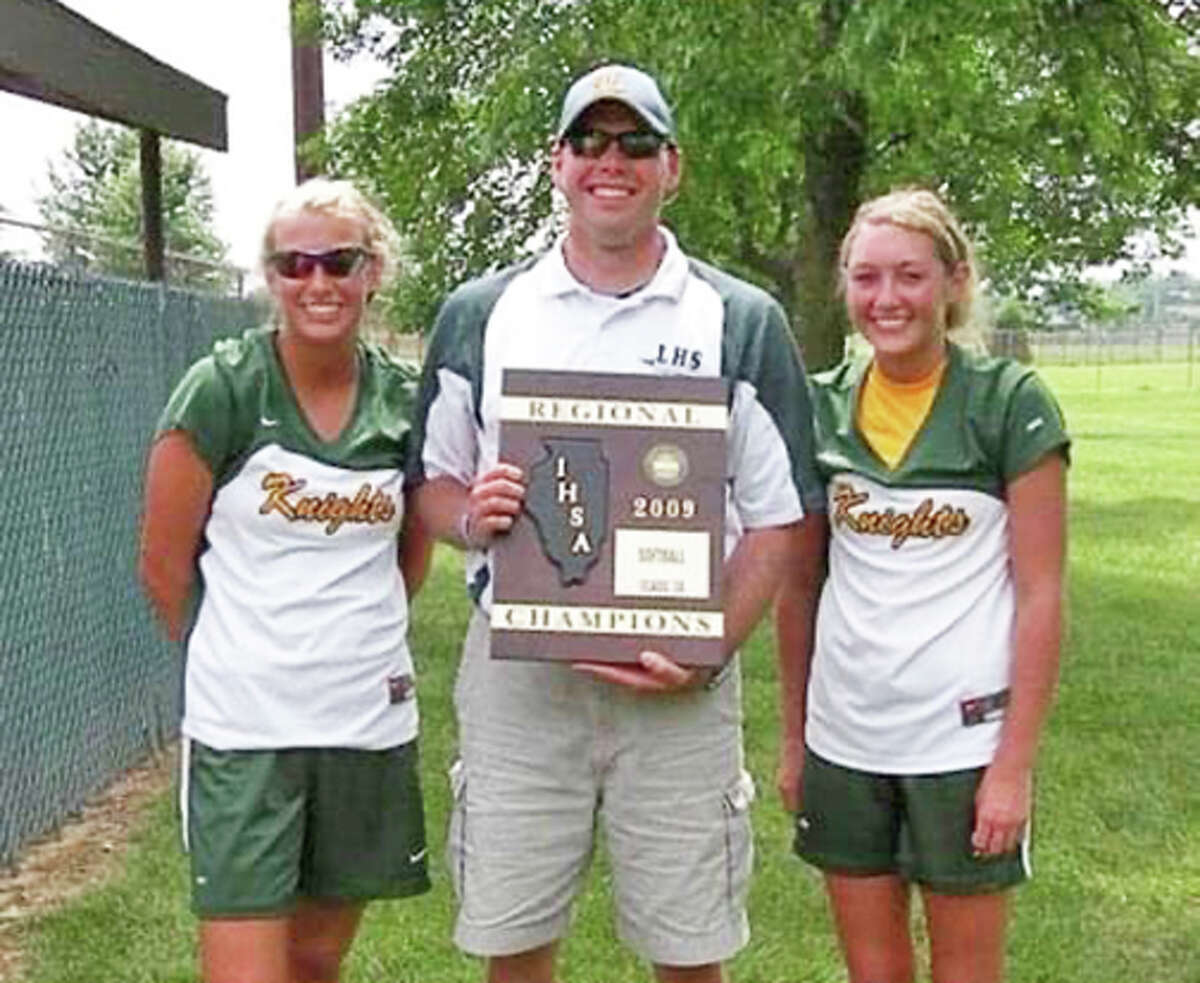 Sisters Maggie Scharnhorst, left, and Molly Scharnhorst, right, with coach Rob Stock after the Metro-East Lutheran softball team won the regional championship in 2009. Maggie was a senior and Molly was a freshman.