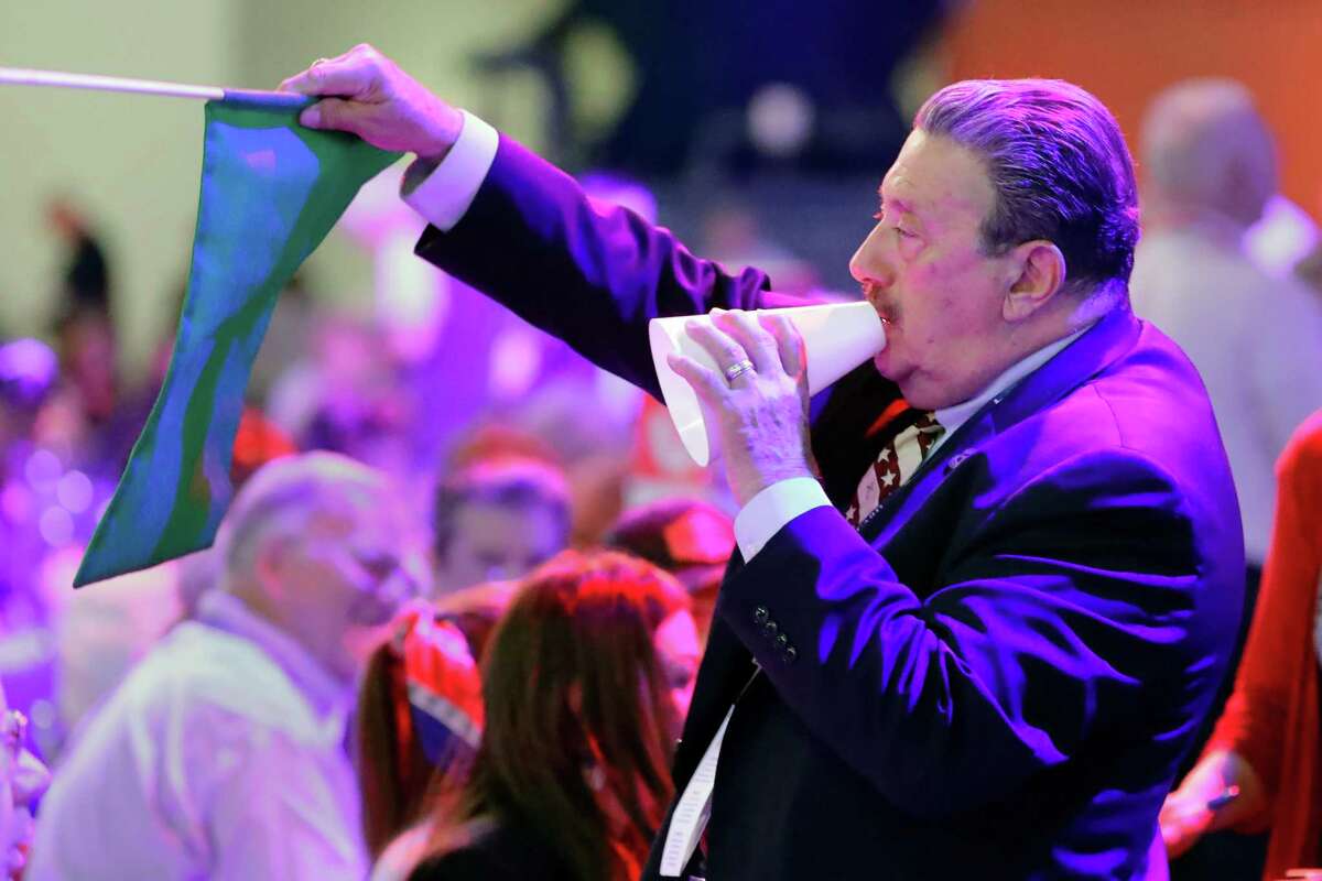 SD 7 delegate Alan Vera uses a megaphone to help direct priority ballots among the other delegates of his distict during the third and final day of this year’s Republican Party of Texas Convention Saturday, June 18, 2022, held at the George R. Brown Convention Center in Houston, TX.