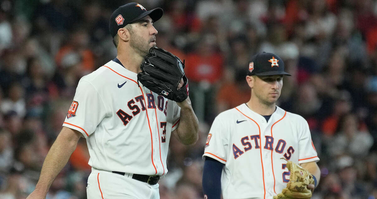 Houston Astros starting pitcher Justin Verlander (35) reacts after Chicago White Sox's Danny Mendick's single during the third inning of an MLB game at Minute Maid Park on Saturday, June 18, 2022 in Houston.