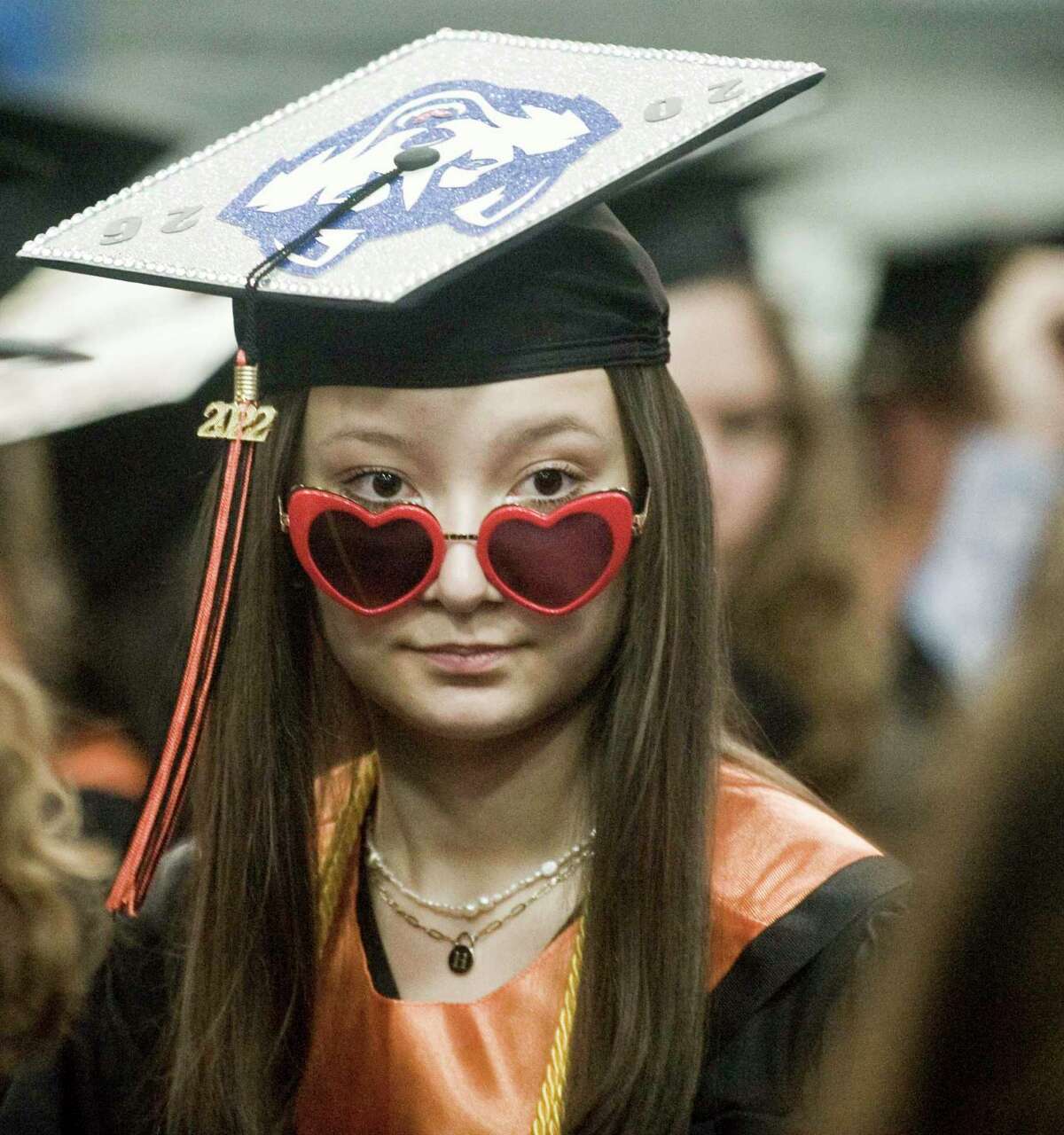 Hailey DeWalt waits for the ceremony to begin at the Ridgefield High School graduation at the O'Neill Center. Friday, June 17, 2022