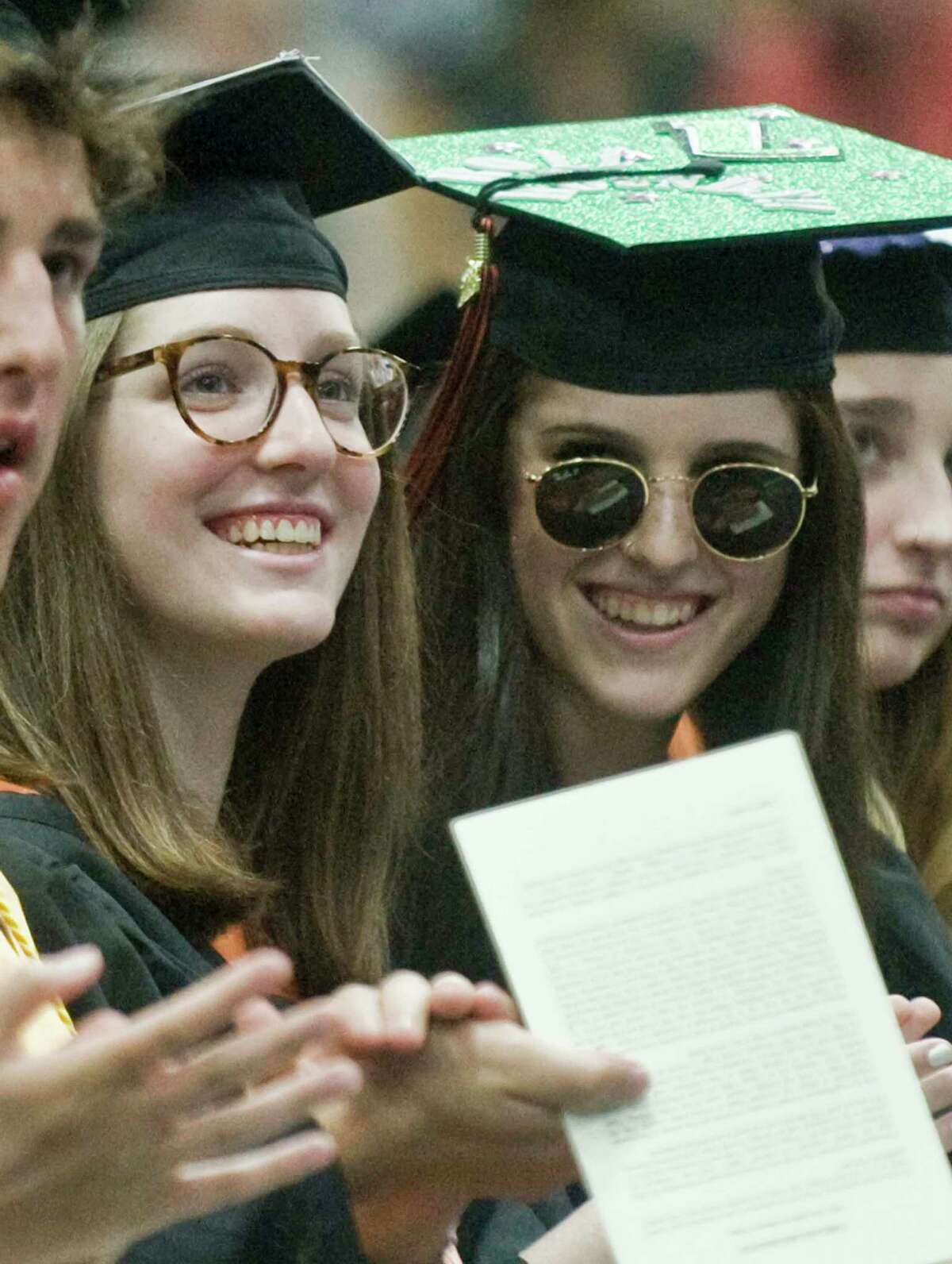 Melissa Ascher and her sister, Jade, enjoying the ceremony at the Ridgefield High School graduation held at the O'Neill Center. Friday, June 17, 2022