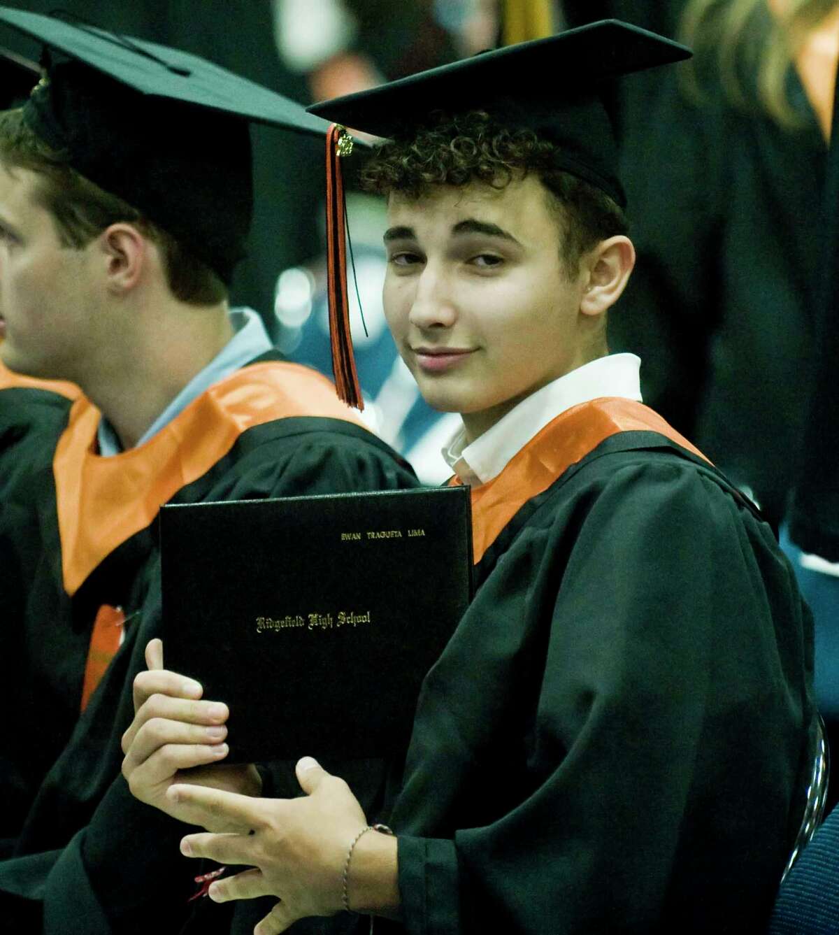 Ewan Lima with his diploma at the Ridgefield High School graduation held at the O'Neill Center. Friday, June 17, 2022