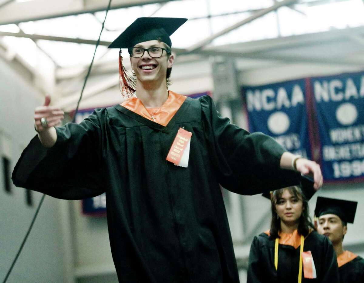 Joseph Misurelli walks onto the stage to receive his diploma at the Ridgefield High School graduation held at the O'Neill Center. Friday, June 17, 2022