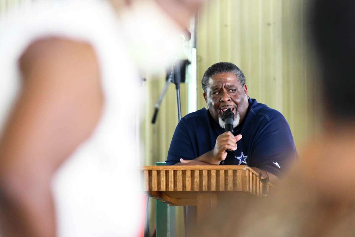 Pastor D.W. Brooks Sr. delivers a sermon during Gospel in the Park at the Juneteenth Festival at Comanche Park on Sunday in San Antonio.