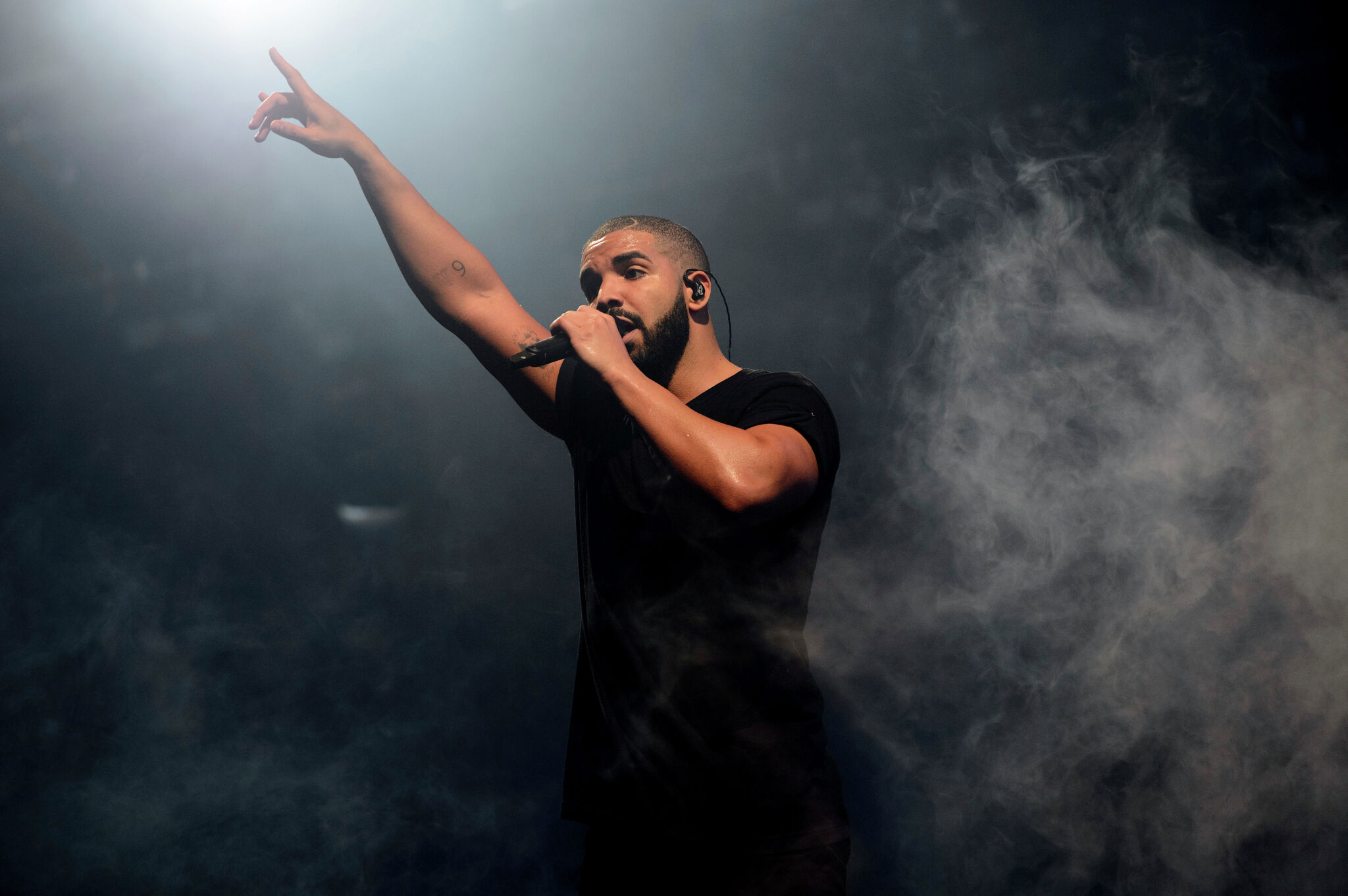 Drake tells fans at Houston concert he's moving to Texas