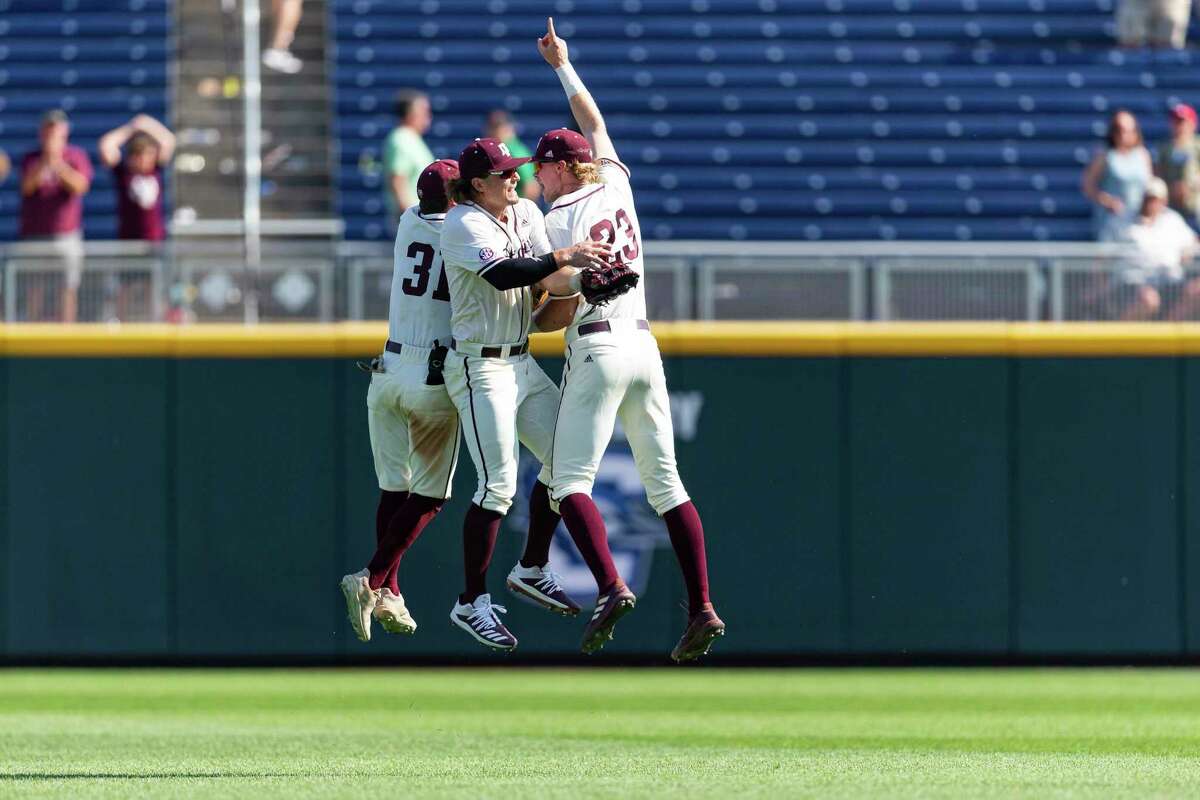 After breaking the school’s CWS losing streak that had reached nine games, Texas A&M outfielders Jordan Thompson, left, Dylan Rock, center, and Brett Minnich had a spring in their step Sunday.