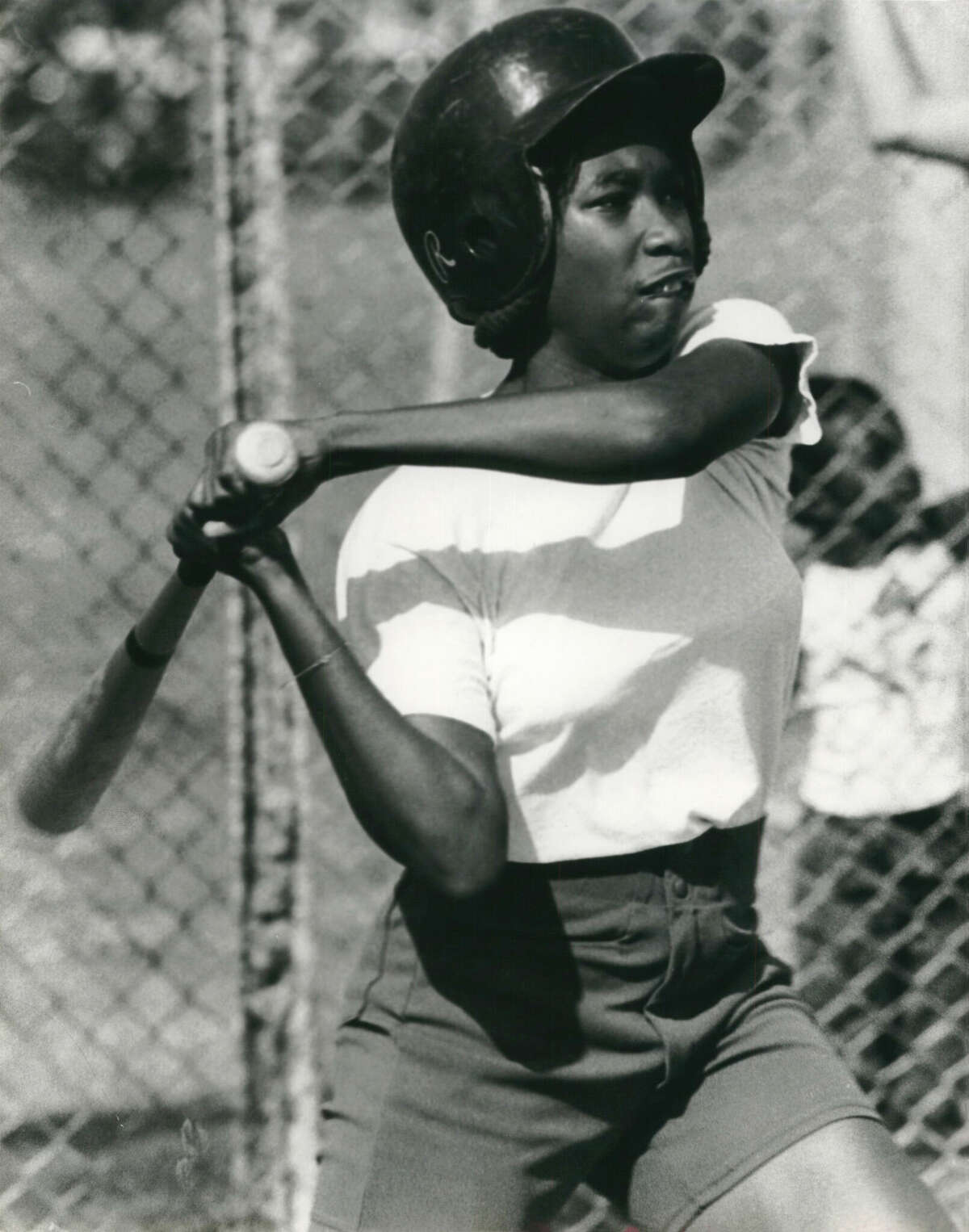 03/28/1978 - Outfielder Linda Williams practices with the Wheatley High School baseball team after she won a ruling in federal court allowing her to play on the team. Williams is the first female to successfully challenge the University Scholastic League for the right to play on a male high school athletic team.
