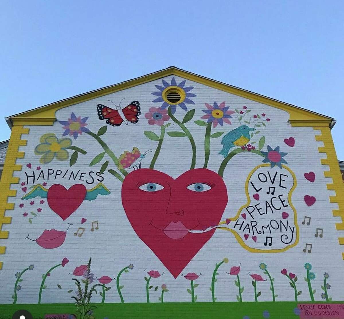 The "LOVE.PEACE.HARMONY" mural at the Circle Inn, painted by Leslie Cober.