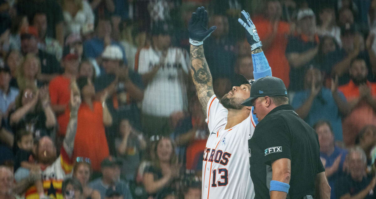 Houston Astros designated hitter J.J. Matijevic (13) celebrates at home plate after hitting his first major league home run during the fourth inning of a game between the Houston Astros and Chicago White Sox on Sunday, June 19, 2022, at Minute Maid Park in Houston.