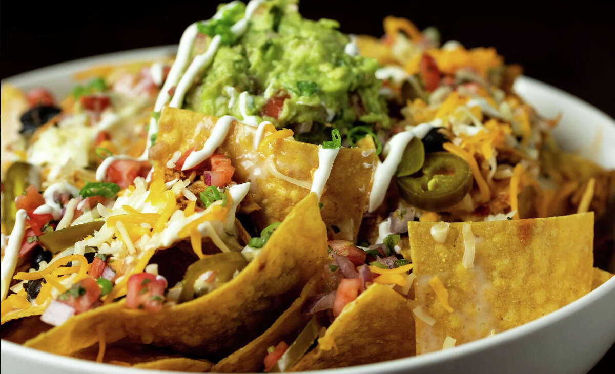 Nachos at The Flats, newly opened in Clifton Park, are available with a choice of chicken, steak or braised short ribs. 