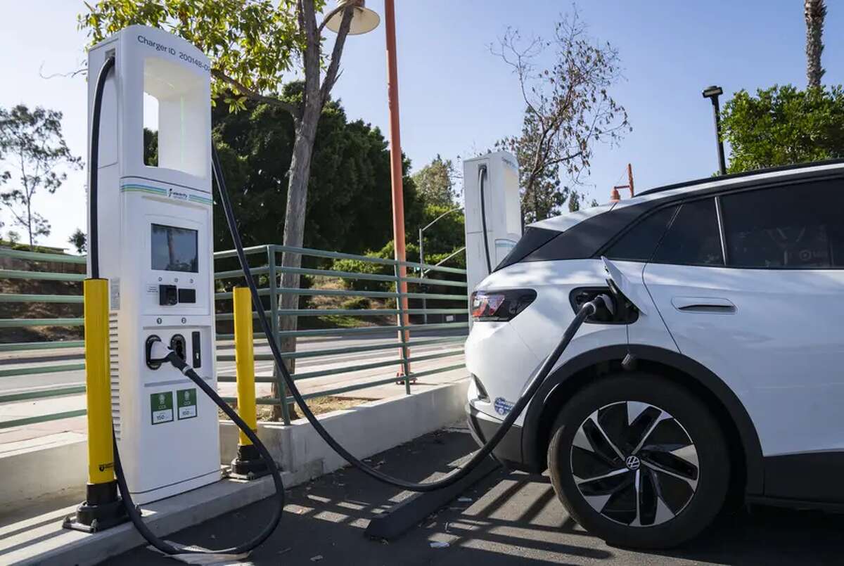 An electric vehicle charging station in San Diego. Texas wants to create a network of charging stations for electric vehicles.
