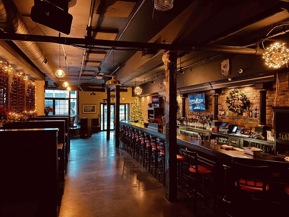 The Copper Crow, damaged by a January flood, is expected to reopen in mid-July in Albany's warehouse district with an interior largely the same as before, as shown above.