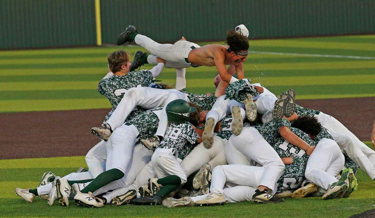 Reagan celebrates after final out as Reagan defeated Lake Travis in Region IV-5A final Game 3 on Saturday, June 4, 2022.
