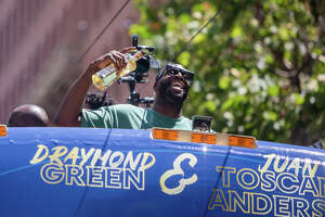 Warriors drink LeBron's tequila during championship parade
