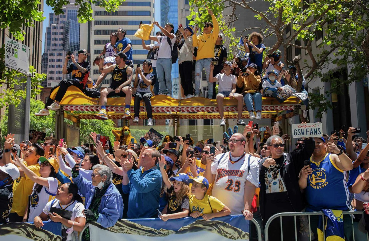 Warriors celebrate championship with parade, champagne and ice cream
