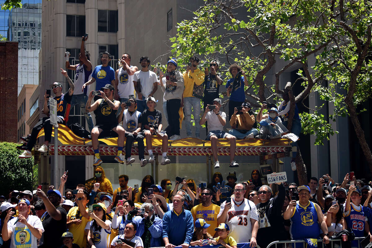 Fans pack every inch of Market Street, during the Warriors victory parade, on Monday, June 20, 2022. 