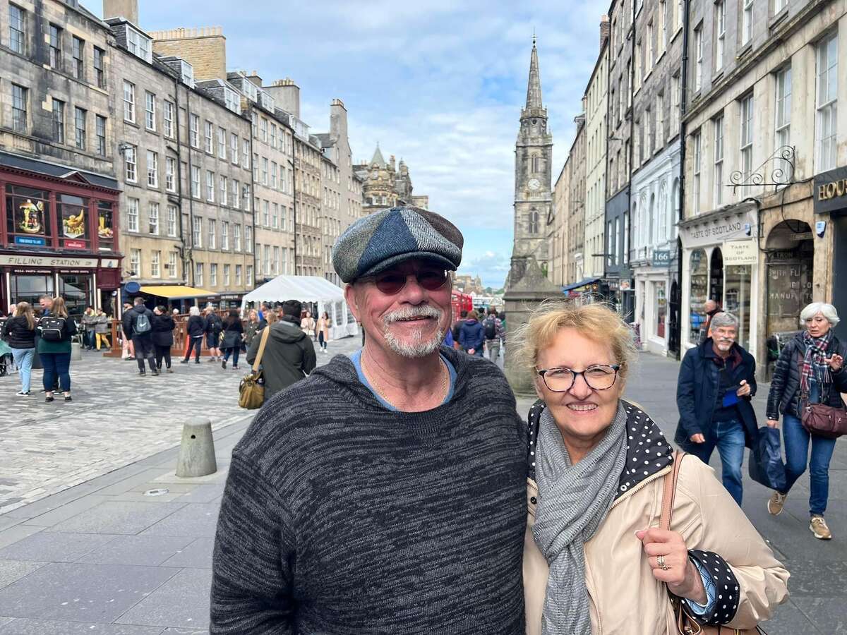 Tom and Ginny Lounsbury take a break on the "Royal Mile" in Edinburgh, Scotland. 