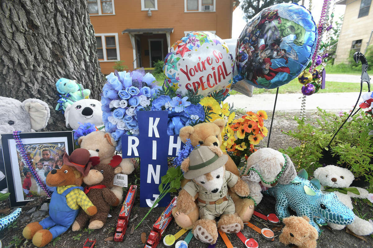 A memorial is growing outside the residence where three-year-old King Dewey was found dead in a locked closet in Port Arthur. Photo made Friday, June 17, 2022. Kim Brent/The Enterprise