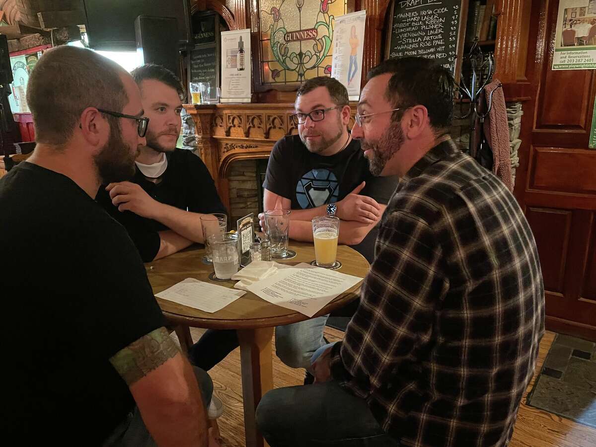 A trivia team at The Playwright on Oct. 13, 2021 in Hamden, Conn. From left to right: Andrew Weinschenker, Bryan McGarthy, Evan Rivessio and Andy Barry.