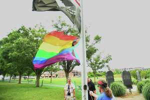 Pride flag raising, food trucks draw crowds to Shelton park