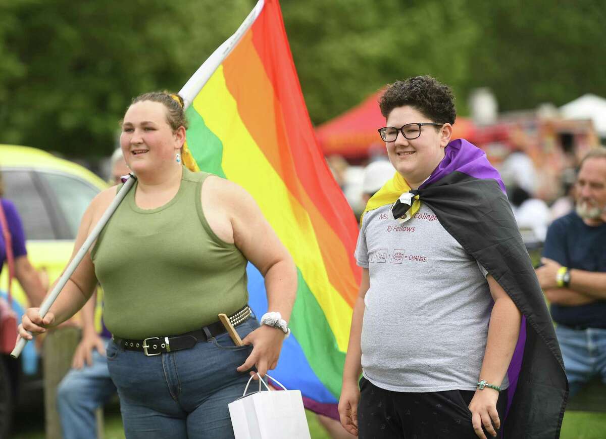 Shelton siblings Rebekkah, left, and Florian Hurlbert attend the Pride Flag raising ceremony.
