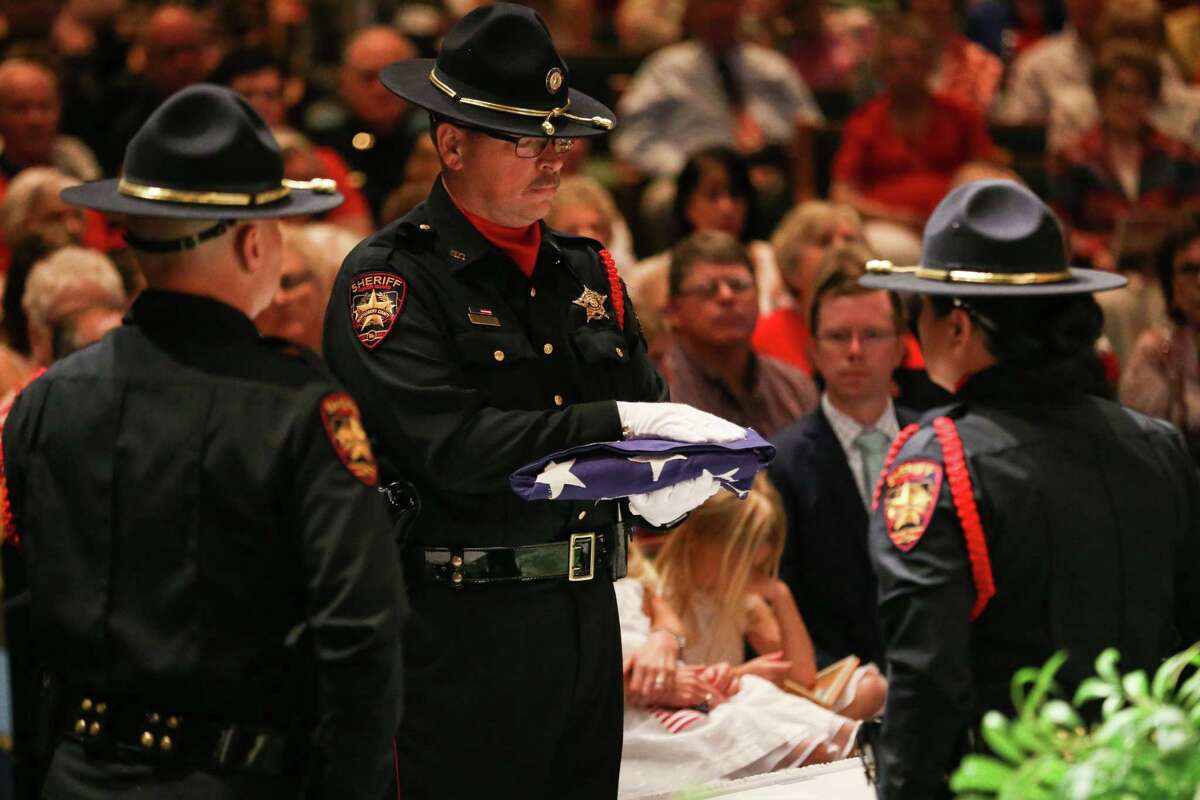 The Montgomery County Sheriff's Office Honor Guard folds a US flag during the Celebrate America event on Sunday, June 24, 2018, at Mims Baptist Church in Conroe. This year’s “Celebrate America” is set for this Sunday with a special patriotic worship service at 10:30 a.m. and evening activities starting at 6 p.m.