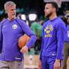 Golden State Warriors' assistant coach Bruce Fraser talks to Stephen Curry, 30, during his pregame warmup prior to Game 6 of the NBA Finals against the Boston Celtics on Thursday, June 16, 2022, in Boston, Mass.