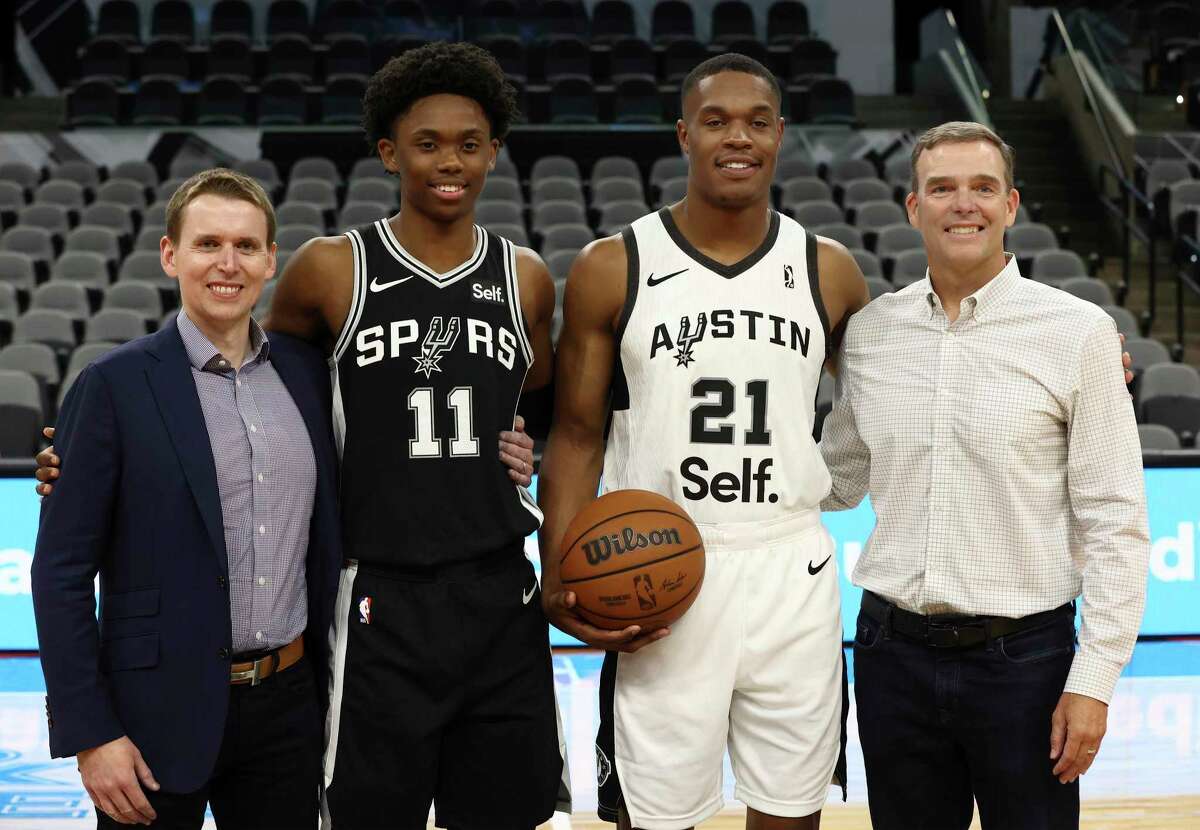 Self Financial CEO James Garvey (from left), Spurs guard Josh Primo, Austin Spurs' Robert Woodard, II and Self Financial Communication Chief Brett Billick pose for a photo as the San Antonio Spurs announce in a press conference their new corporate partnership with Austin-based Self Financial, Inc. - a financial technology company - on Tuesday, June 21, 2022. The Spurs and the G-League Austin Spurs will sport the Self corporate logos on their jerseys this upcoming season.