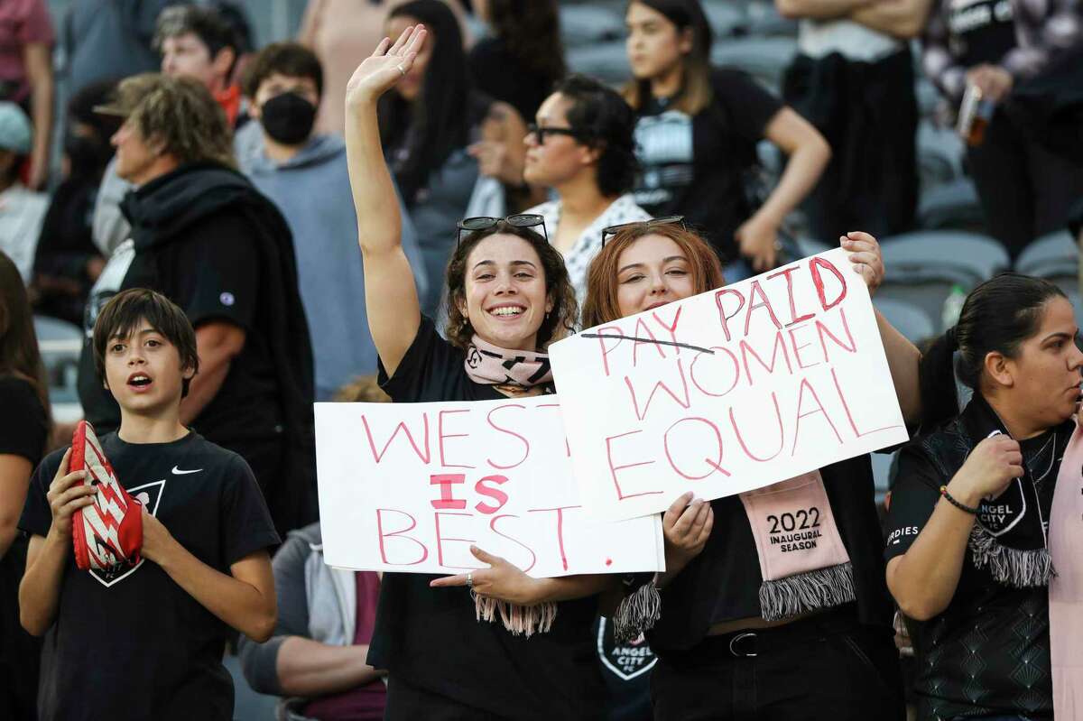 LOS ANGELES, CALIFORNIA - MAY 29: Angel City FC fans hold up signs after the game against the NJ/NY Gotham FC at Banc of California Stadium on May 29, 2022 in Los Angeles, California. (Photo by Meg Oliphant/Getty Images for Angel City FC)