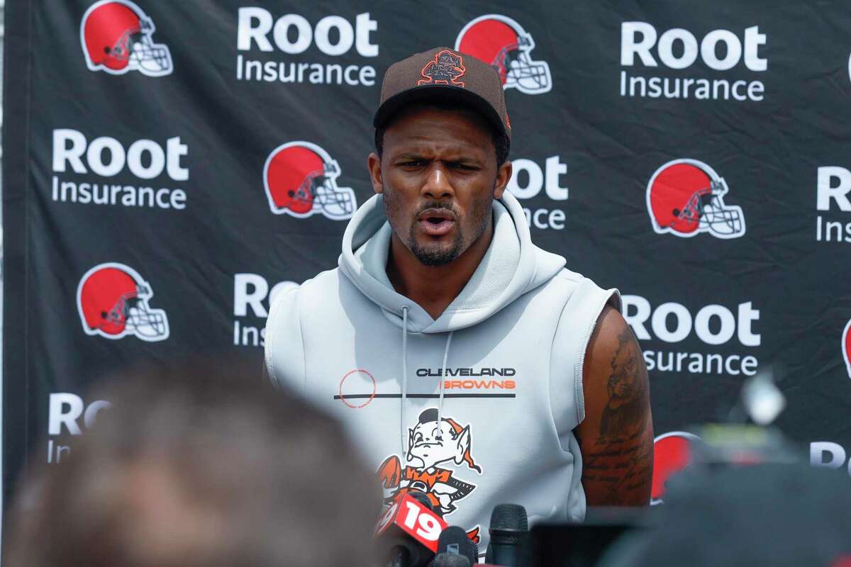 Cleveland Browns quarterback Deshaun Watson answers a question after practice at the NFL football team's practice facility Tuesday, June 14, 2022, in Berea, Ohio. (AP Photo/Ron Schwane)