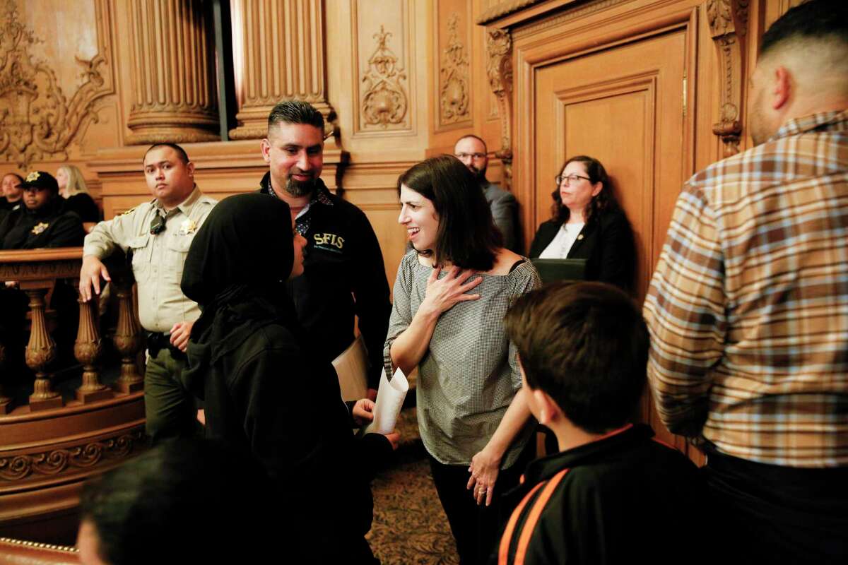 District Nine Supervisor Hillary Ronen greets San Francisco Islamic School students during a committee meeting at City Hall in 2019.