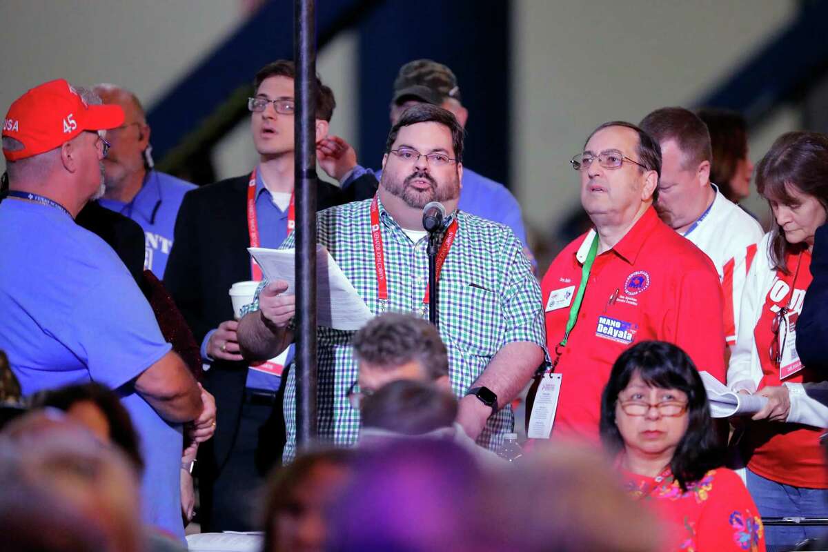 Delegates line up to argue for and against various planks of the the party’s platform during the third and final day of this year’s Republican Party of Texas Convention Saturday, June 18, 2022, held at the George R. Brown Convention Center in Houston, TX.