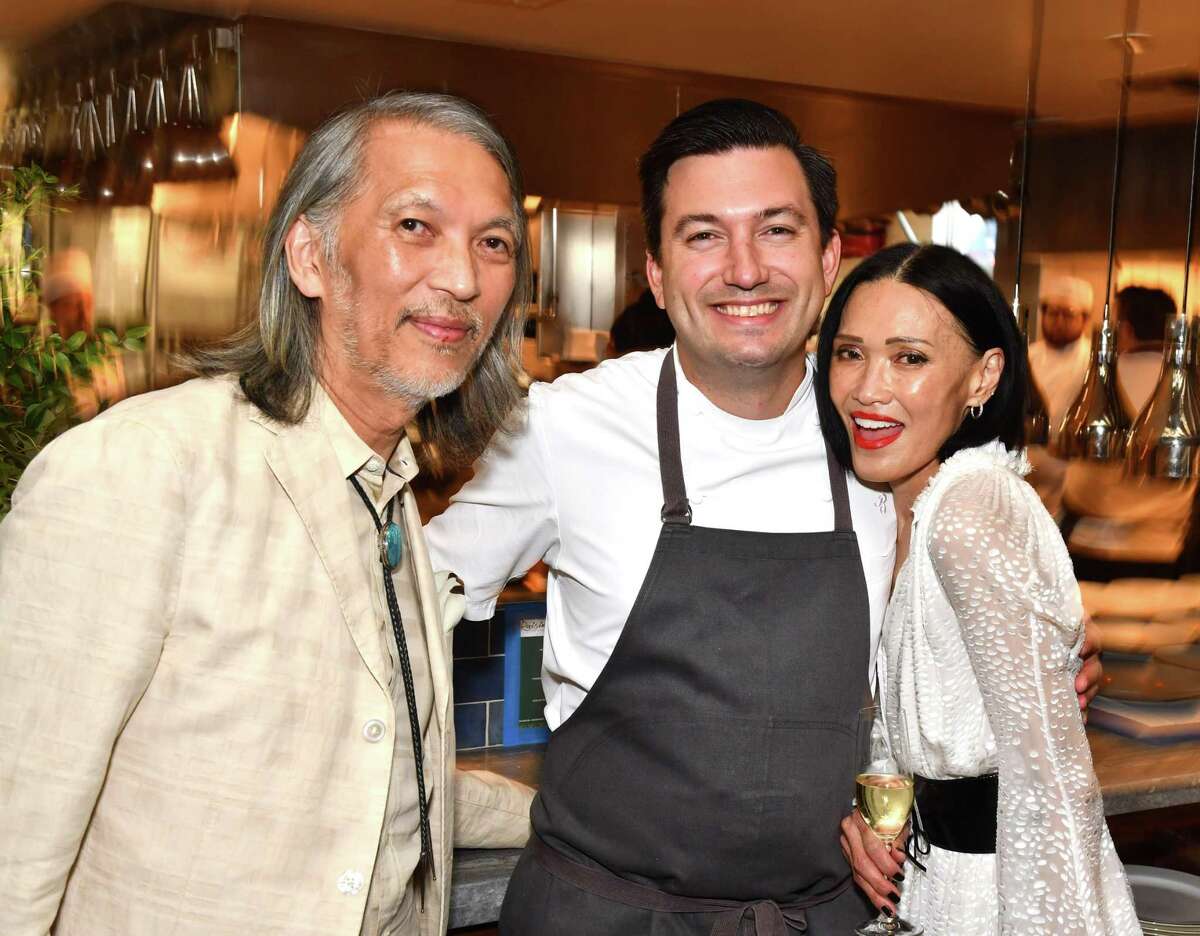 Chef Aaron Bludorn with Marc and Duyen Nguyen at the annual Raising the Barre event which pairs top Houston chefs with Houston Ballet Company principal dancers at Bludorn Sunday April 24, 2022.