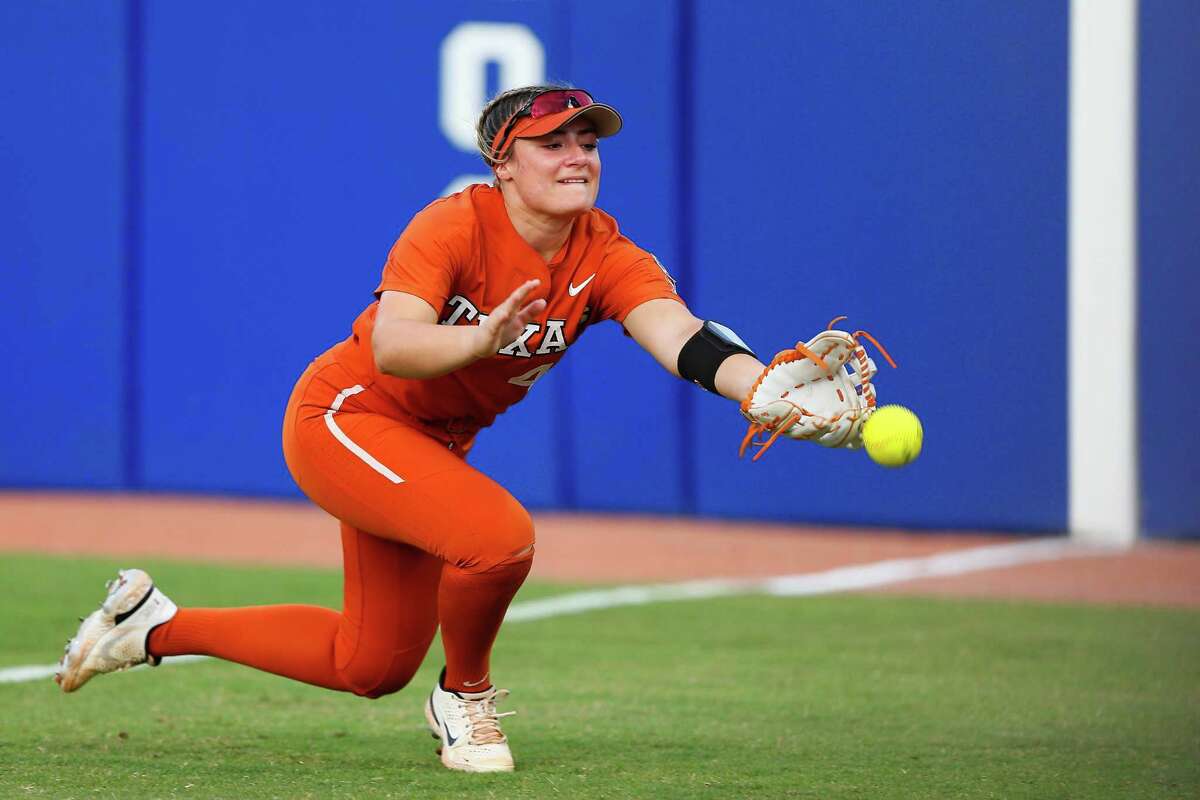 OKLAHOMA CITY, OK - JUNE 9: Katie Cimusz #44 of the Texas Longhorns can't quite get to a deep foul ball in the fourth inning during the NCAA Women's College World Series championship finals at the USA Softball Hall of Fame Complex on June 9, 2022 in Oklahoma City, Oklahoma. Oklahoma won 10-5. (Photo by Brian Bahr/Getty Images)