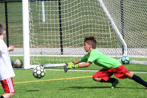 'Keeping things moving': Growing soccer fun at Marquette camp ... w/11 photos