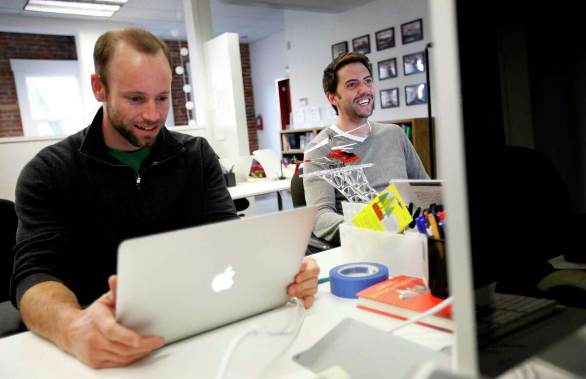 Omada Health co-founders Adrian James (left) and Sean Duffy work in the offices of a health care startup incubator called RockHealth in San Francisco in 2011.