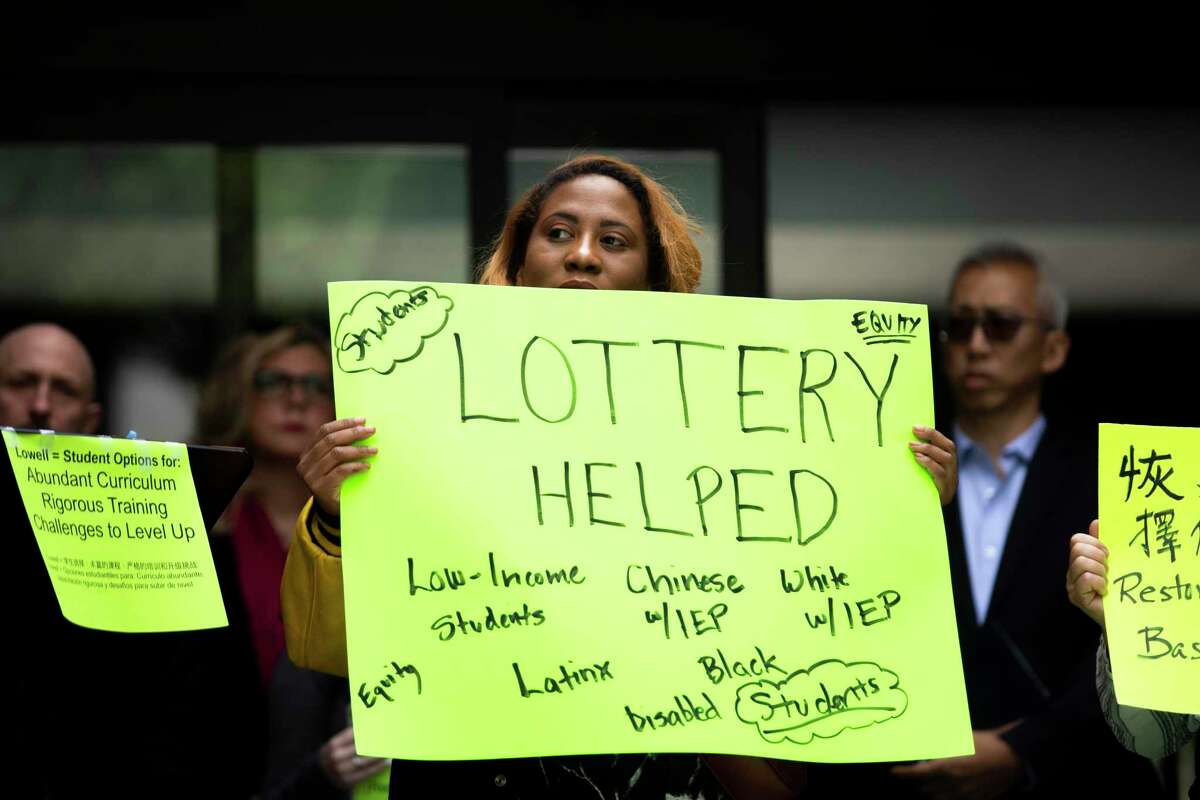 Bivett Brackett rallied in favor of the lottery-based admission process that has been in effect at Lowell High School. The school board voted to restore merit-based admission.