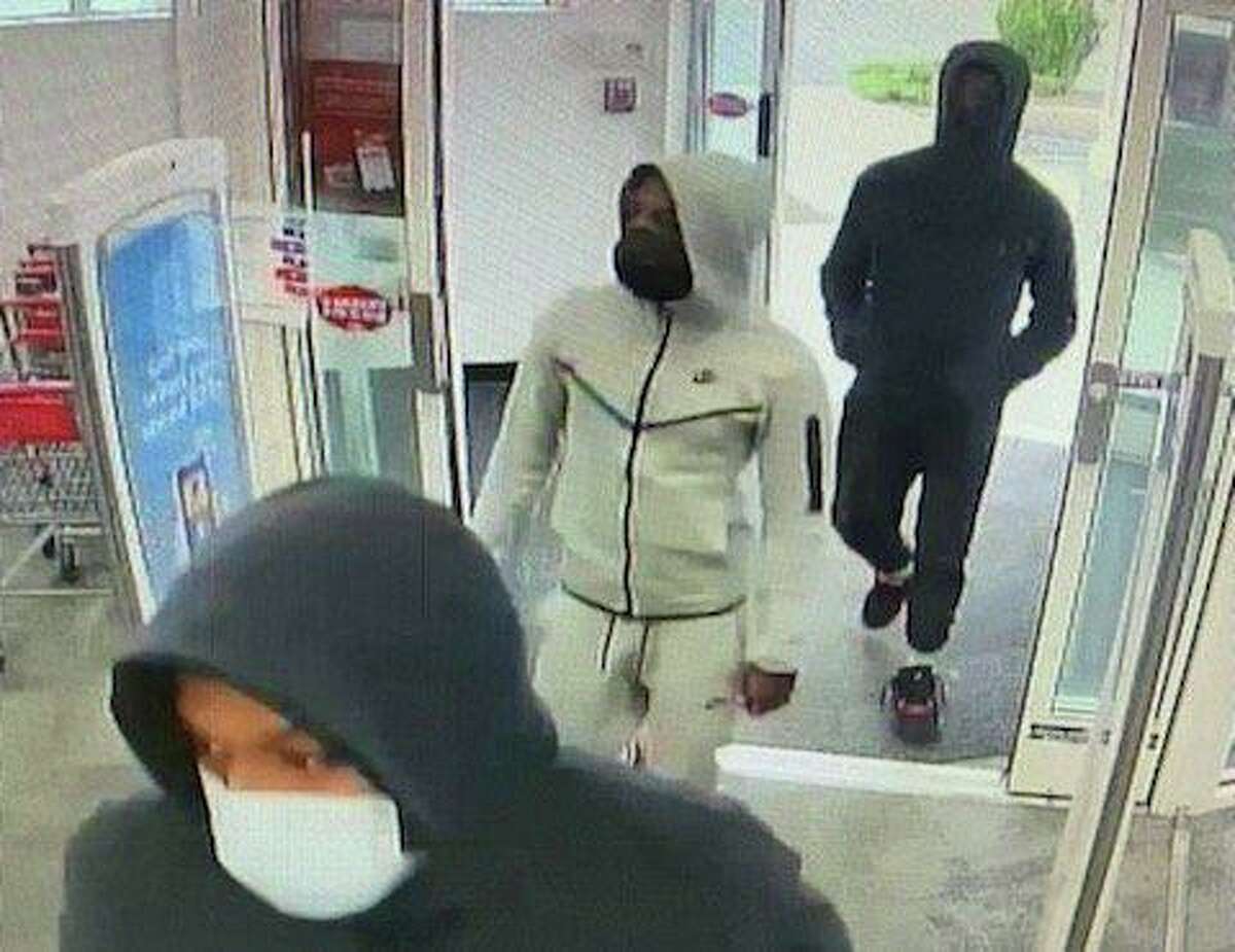 Milford police have released security footage photos of three men they say stole about $15,000 worth of drugs Rite Aid on Tuesday.