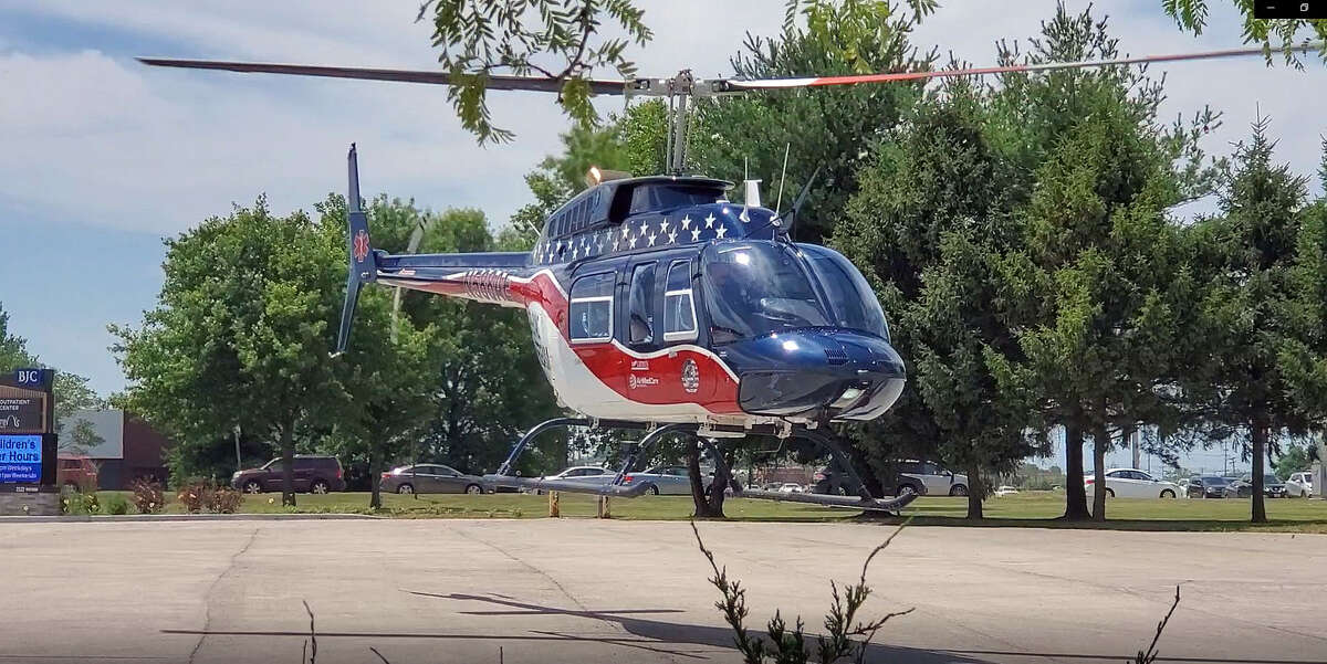 An Air Evac Lifeteam helicopter landed in the parking lot of the Kohl's and BJC Outpatient Center to airlift one of the driver's to a St. Louis area hospital Wednesday. 