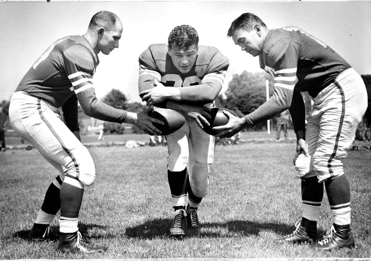 From left, the 49ers’ Y.A. Tittle, Hugh McElhenny and Frankie Albert on July 7, 1952.