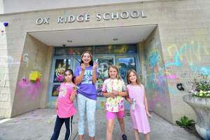 Saying goodbye to a Darien school with chalk, paint, tears