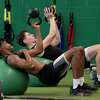 Siena basketball player Javian McCollum, left, and Aidan Dagostino are seen working out in the strength and conditioning suite with his team at the Marcelle Athletic Complex at Siena College on Thursday, June 23, 2022 in Loudonville, N.Y.