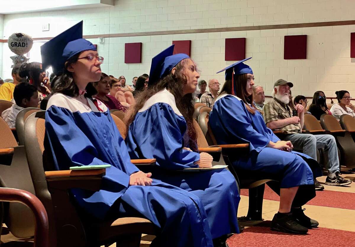 The members of the January and June graduates in the Class of 2022 from the Alternative Center for Excellence in Danbury gather together for commencement exercises recently in the auditorium at Broadview Middle School.