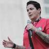 Veteran and former Houston Dash goalie Haley Carter addresses attendees of a women veterans march at city hall on Saturday, June 9, 2018 in Houston. The veterans marched to celebrate progress and speak out for against abuse and challenges they face. (Elizabeth Conley/Houston Chronicle)