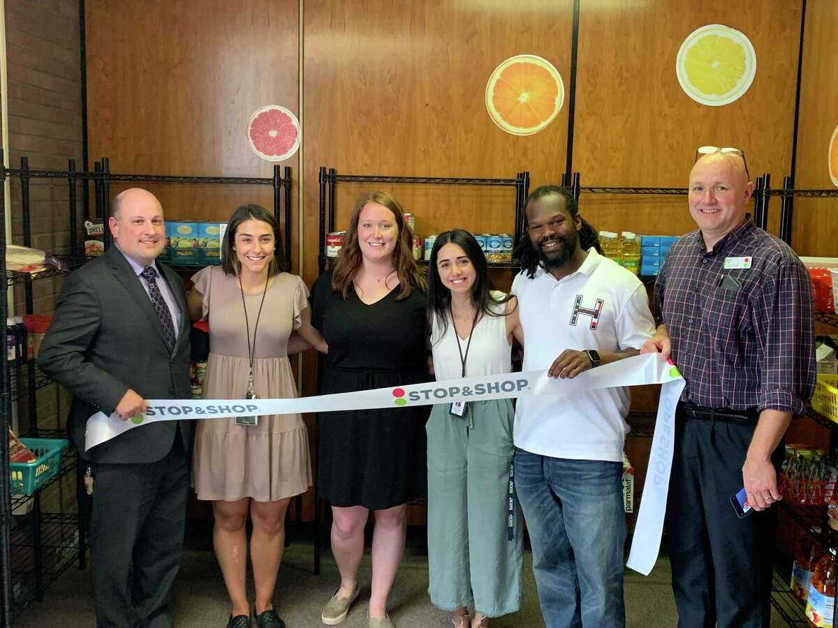 Representatives from Stop & Shop and ACES Wintergreen Interdistrict Magnet School attend a ribbon cutting for a school food pantry.