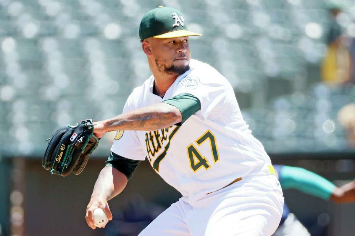 Oakland Athletics Pitcher Frankie Montas (47) throws a pitch