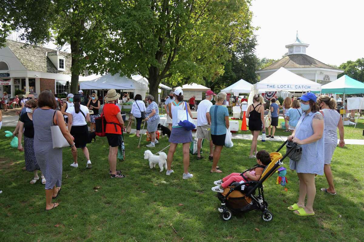 The Sherman Green in Fairfield is busy with visitors, and vendors at a previous Fairfield Farmers Market in a recent year. The market has returned, began for its seventh season, and 2022 June 12, with the event being every Sunday, from 10 a.m. to 2 p.m. rain or shine on the Sherman Green in Fairfield, and over 30 local farms, and small batch food producers participating in the grocery shopping option.