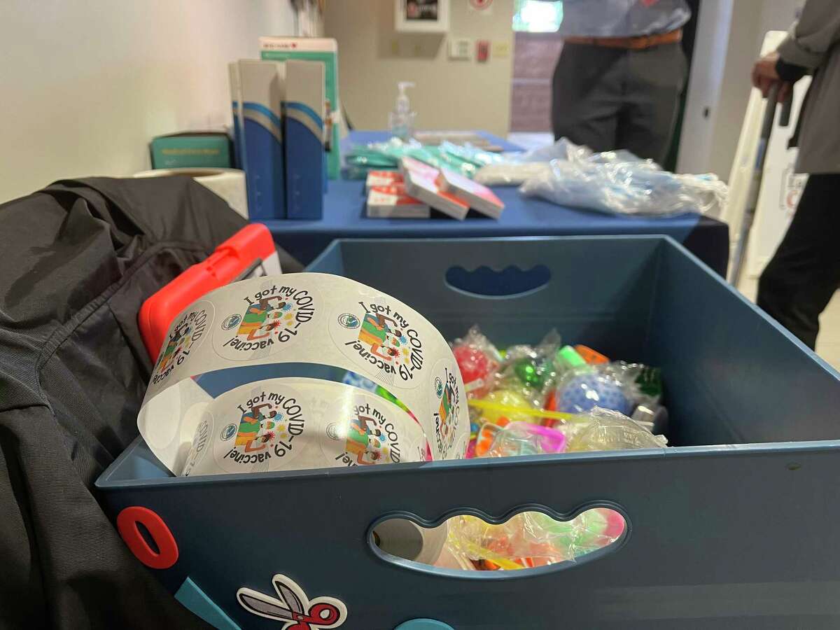 A vaccine clinic Wednesday in East Hartford was similar to previous vaccine clinics except for a few small tweaks, such as a box of colorful toys for kids to choose from.
